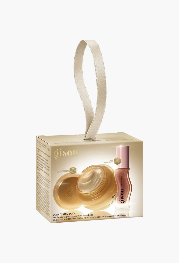 GLAM MODA Gisou Mini Gloss Duo set featuring a honey-infused hair mask and Glazed Plum lip oil in gift packaging.