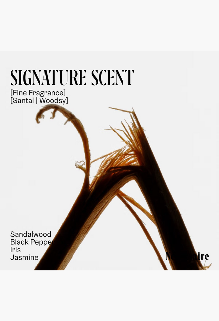 GLAM MODA Nécessaire The Body Wash Santal featuring artistic sandalwood branch imagery with fragrance notes listed