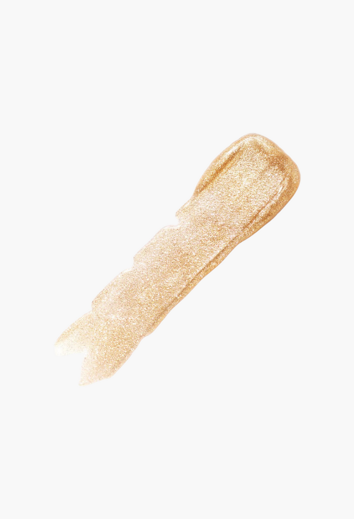 GLAM MODA VIEVE Lip Dew swatch showing a shimmering gold, high-shine non-sticky lip treatment texture