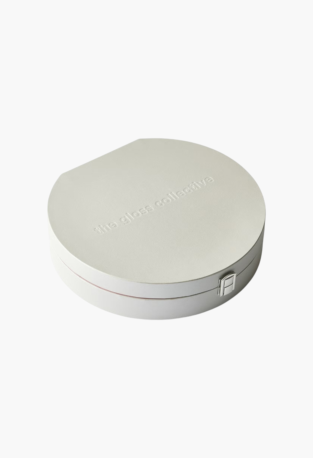 GLAM MODA The Gloss Collective limited-edition beauty gift set in a round, light grey textured presentation box.