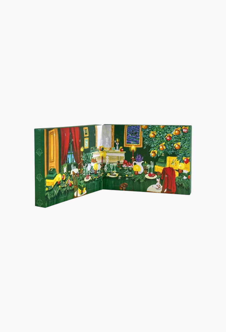 GLAM MODA L'Occitane Beauty Advent Calendar featuring a festive green holiday illustration with 24 numbered doors.