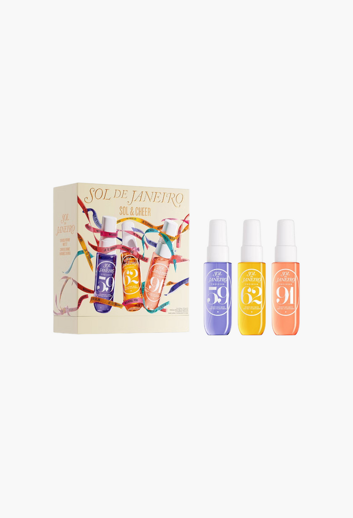 GLAM MODA Sol de Janeiro Sol & Cheer Set featuring three travel-sized perfume mists in purple, yellow, and orange.