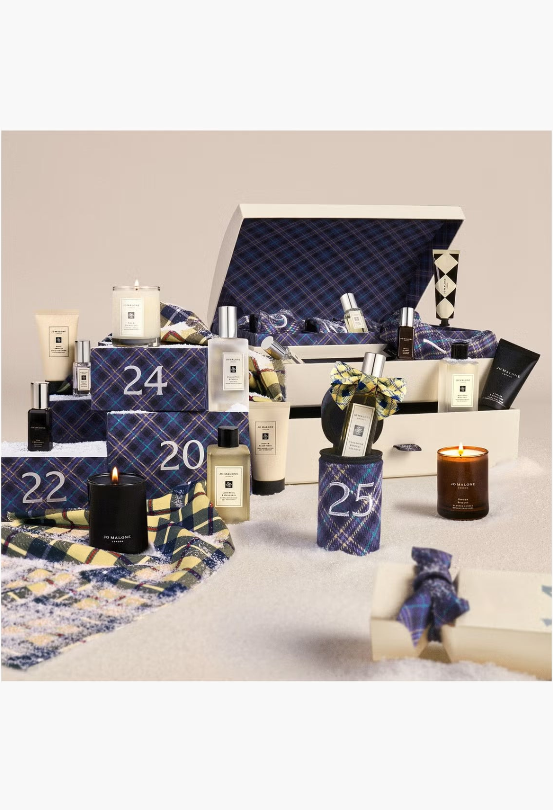 GLAM MODA Jo Malone London luxury fragrance advent calendar with 25 scented candles, colognes, and body care products.