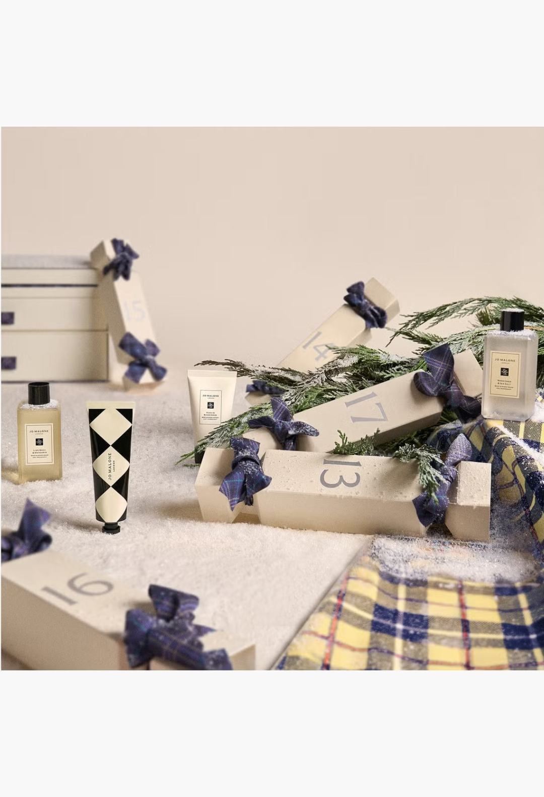 GLAM MODA Jo Malone London luxury fragrance advent calendar featuring scented colognes and bath treats in festive decor