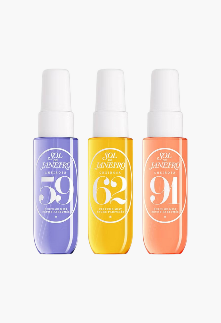 GLAM MODA Sol de Janeiro Sol & Cheer Set featuring three travel-sized perfume mists in purple, yellow, and orange.