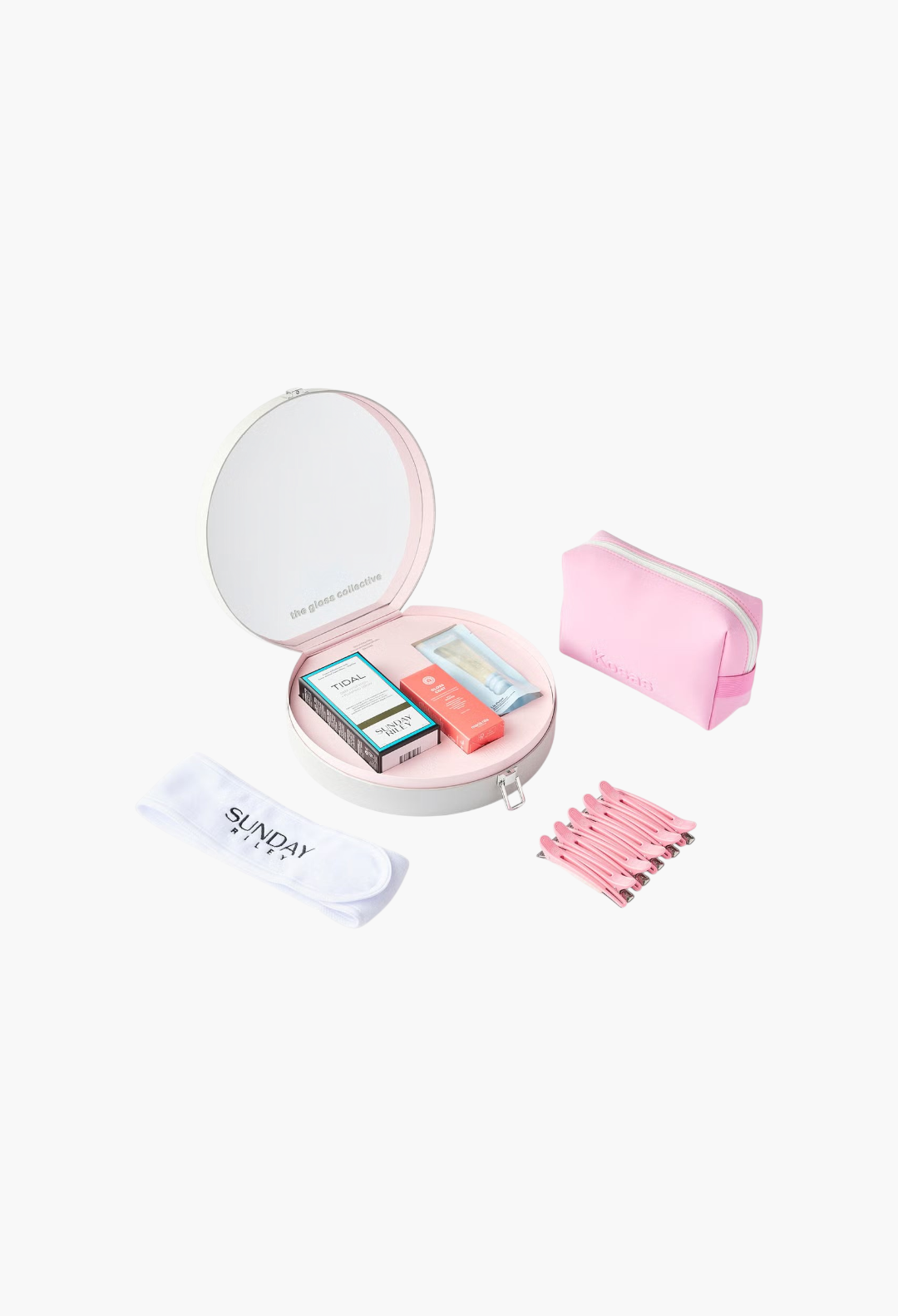 GLAM MODA The Gloss Collective beauty set featuring Sunday Riley serum, Maria Nila gloss, Kosas lip plumper, and bag.
