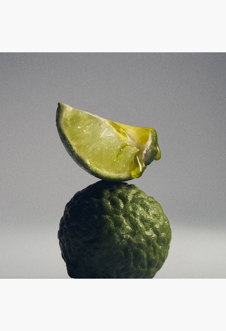GLAM MODA Creed Iris Debonair fragrance ingredient, a fresh green bergamot fruit with a juicy lime wedge on top