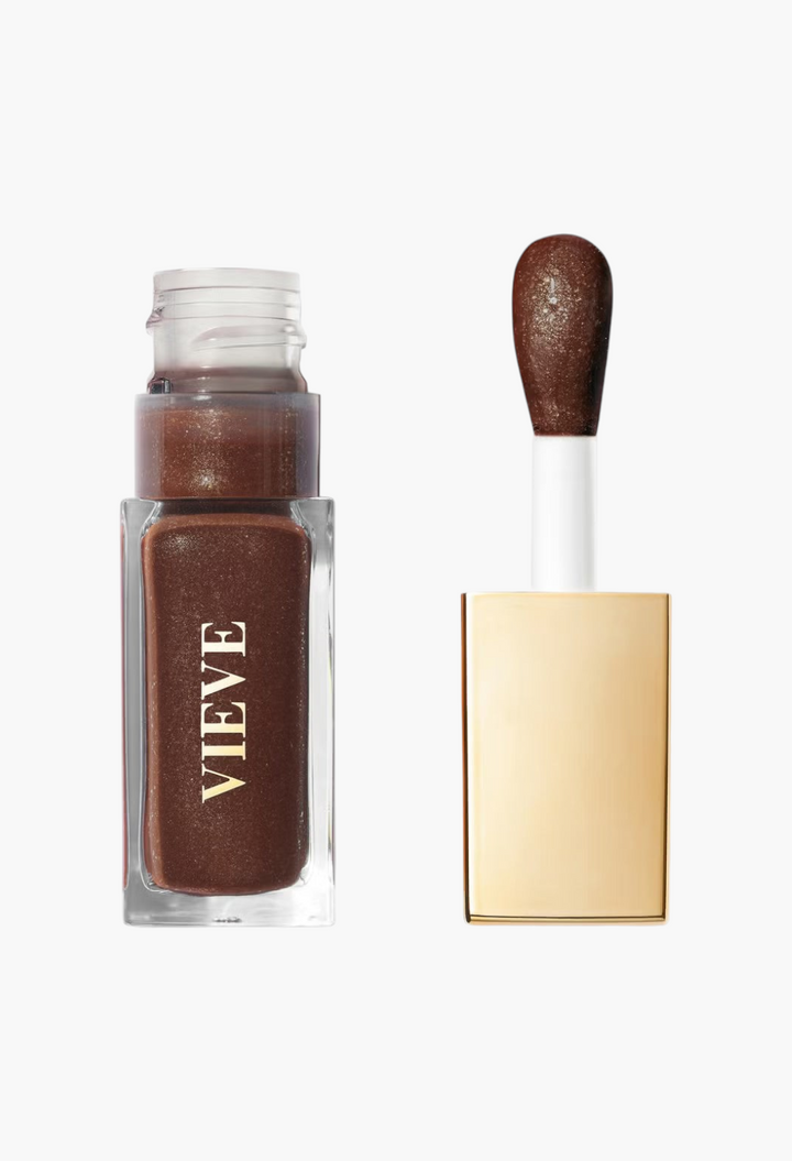 GLAM MODA VIEVE Lip Dew in a deep brown shimmer shade with a gold applicator cap and clear glass bottle.