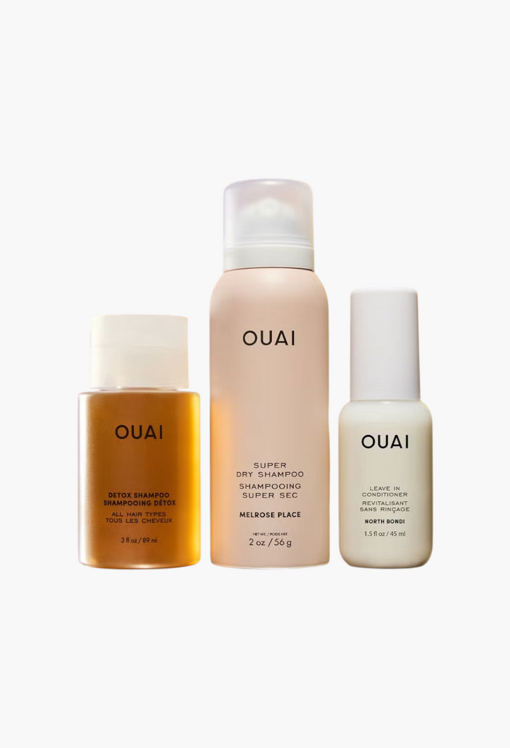 GLAM MODA OUAI Get On Your Merry Kit featuring travel-sized detox shampoo, dry shampoo, and leave-in conditioner.