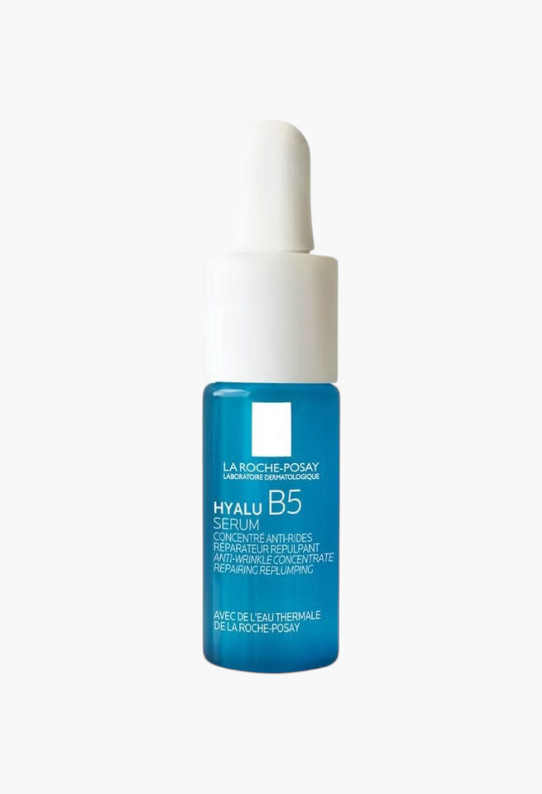 GLAM MODA La Roche-Posay Hyalu B5 serum in a small blue glass bottle with a white dropper cap for facial hydration.