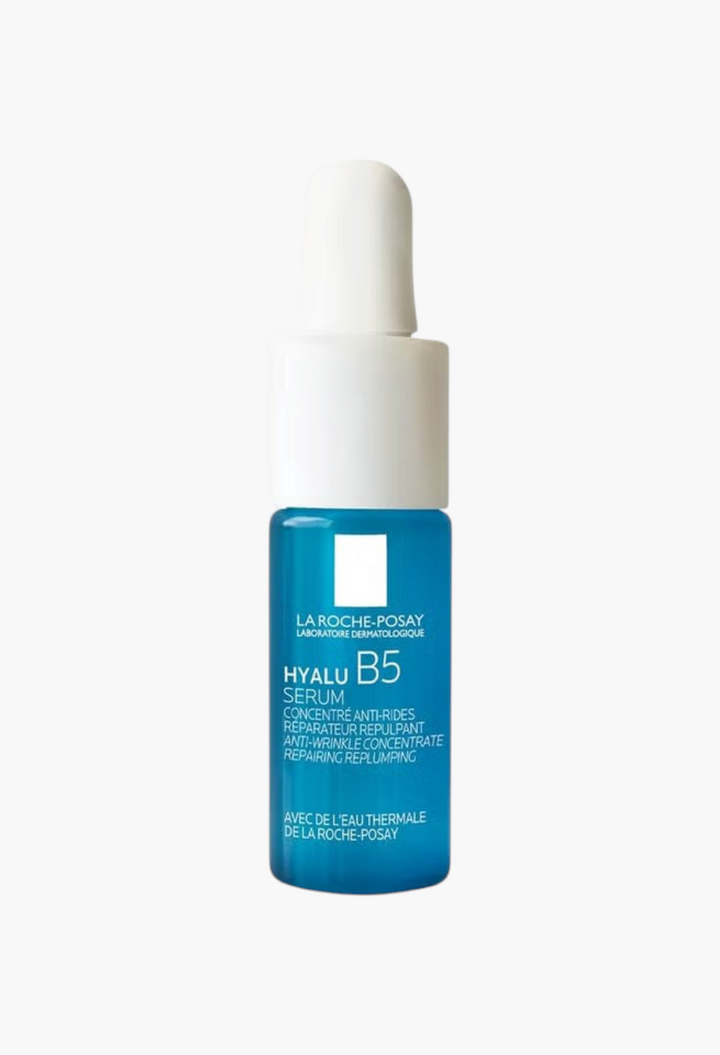 GLAM MODA La Roche-Posay Hyalu B5 serum in a small blue glass bottle with a white dropper cap for facial hydration.