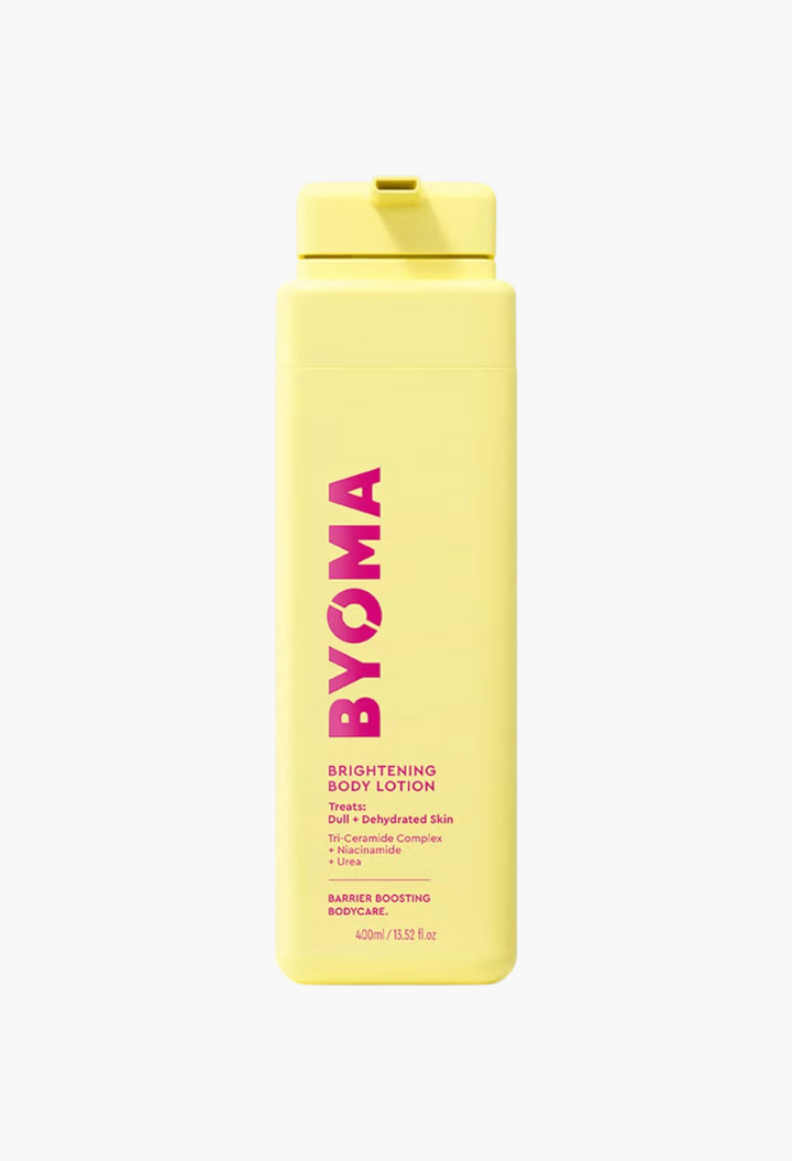 GLAM MODA BYOMA Brightening Body Lotion in a yellow 400ml pump bottle for hydrating and exfoliating dull skin.