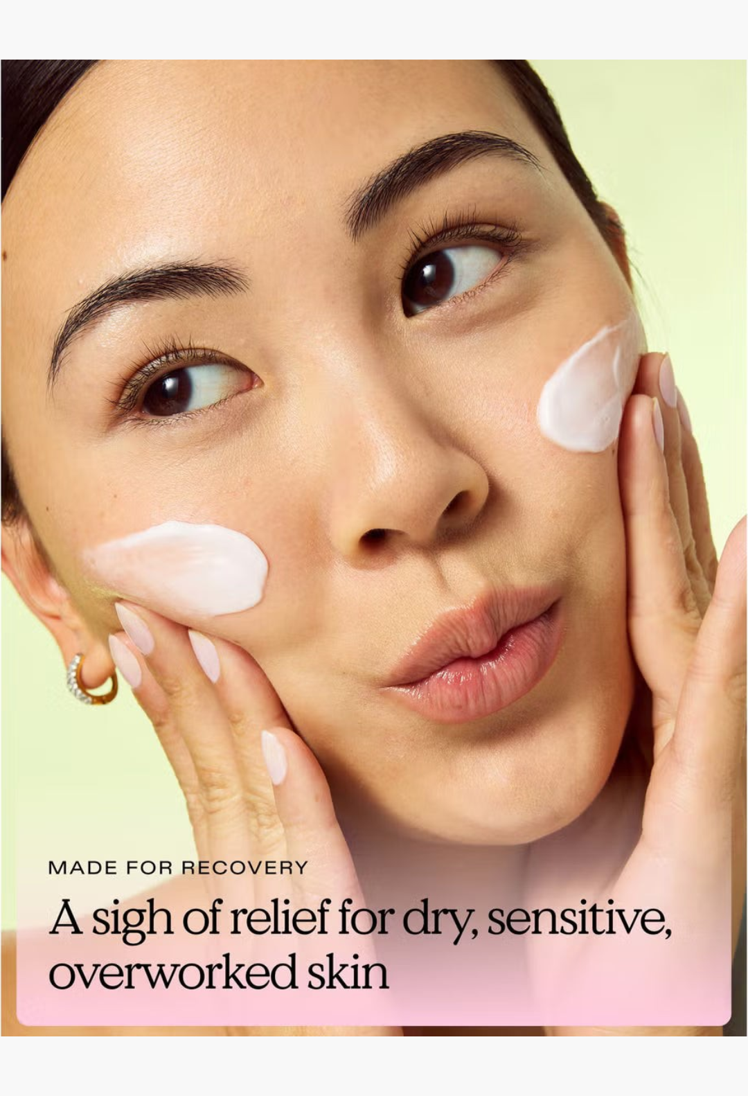 GLAM MODA model applying KraveBeauty Mochi Berrier Moisture Cream to her cheeks for hydration and skin barrier support