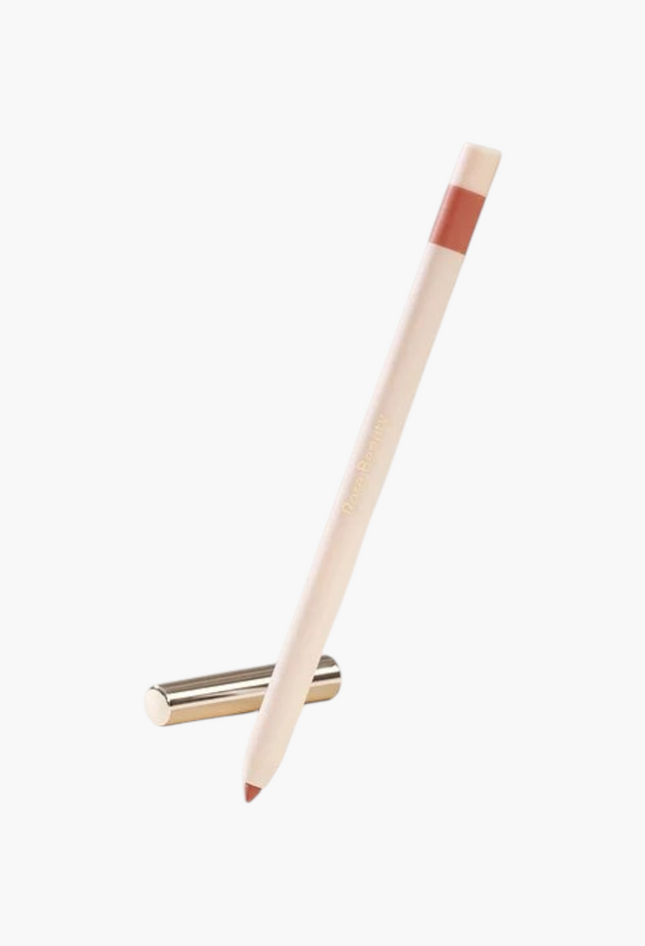 GLAM MODA Kind Words matte lip liner in a neutral beige shade with a sleek, retractable design and metallic cap.