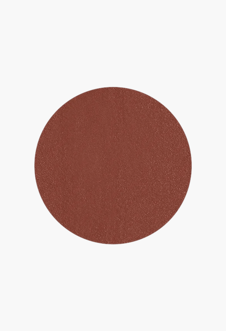 GLAM MODA Kind Words matte lip liner swatch in a rich, warm brown nude shade with a smooth, soft matte finish.