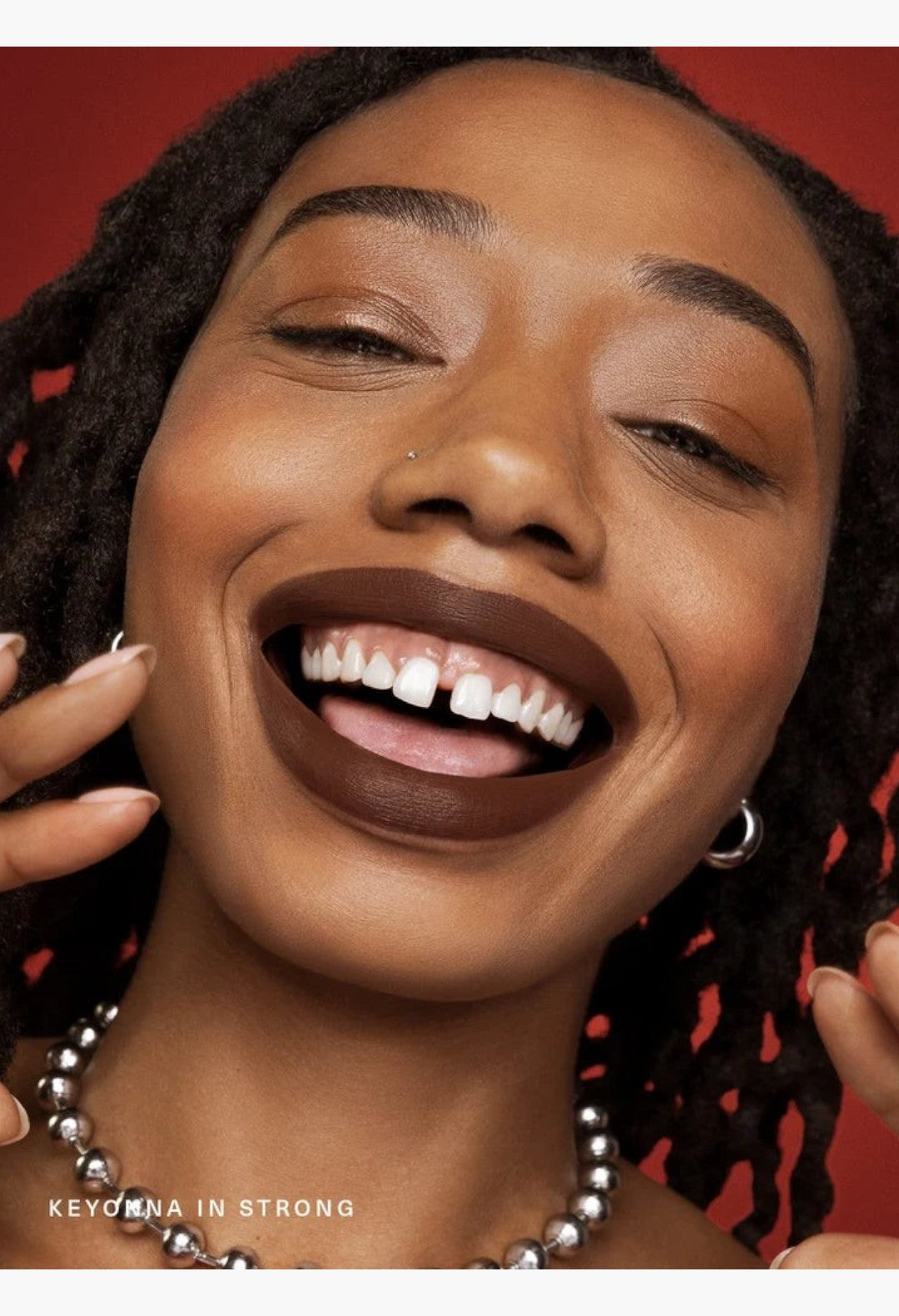GLAM MODA Kind Words Matte Lip Liner in Strong, a rich chocolate brown shade, applied on a smiling model.