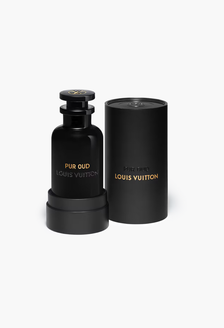 GLAM MODA Pur Oud perfume bottle and black cylindrical case with gold lettering on a white background.