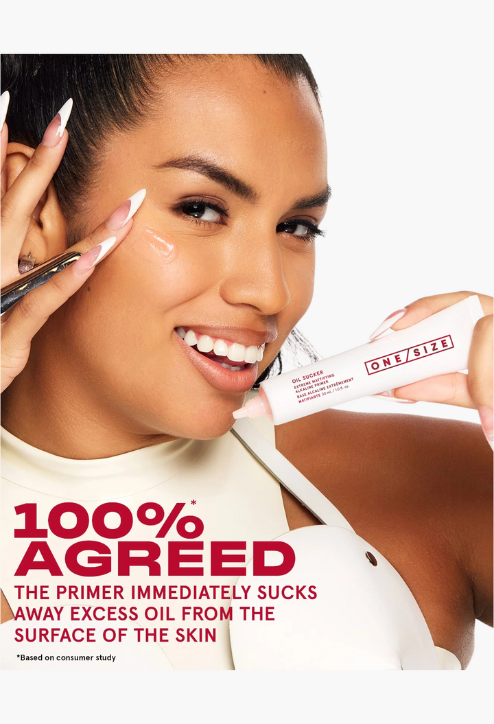GLAM MODA model applying Extreme Mattifying Alkaline Primer to her cheek for oil control and pore tightening.