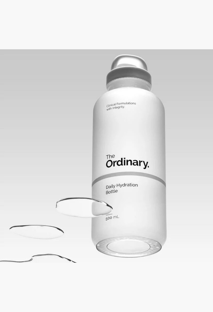 GLAM MODA 500ml frosted glass Daily Hydration Bottle with a white screw cap and minimalist branding