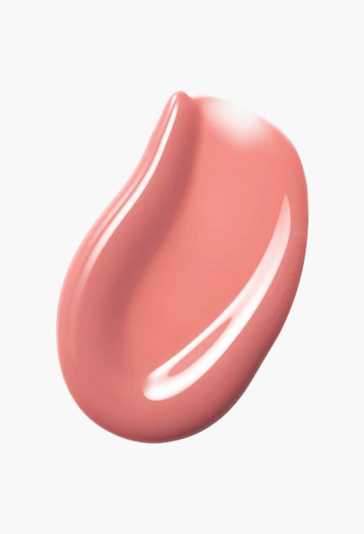 GLAM MODA Posh Gloss high-shine lip gloss swatch in a creamy peach-pink shade with a smooth, reflective finish.