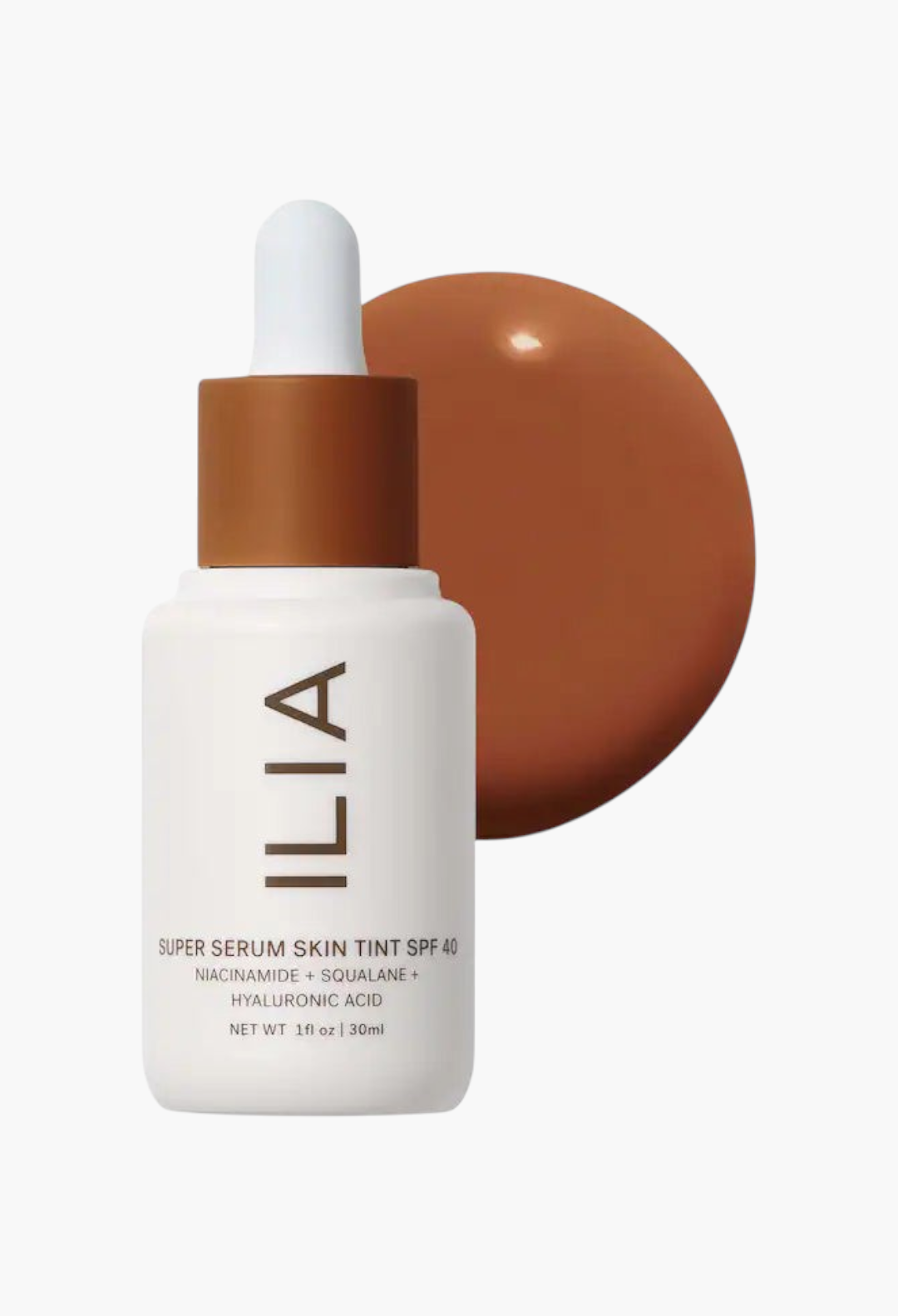 GLAM MODA ILIA Super Serum Skin Tint SPF 40 bottle with a swatch of liquid foundation on a white background