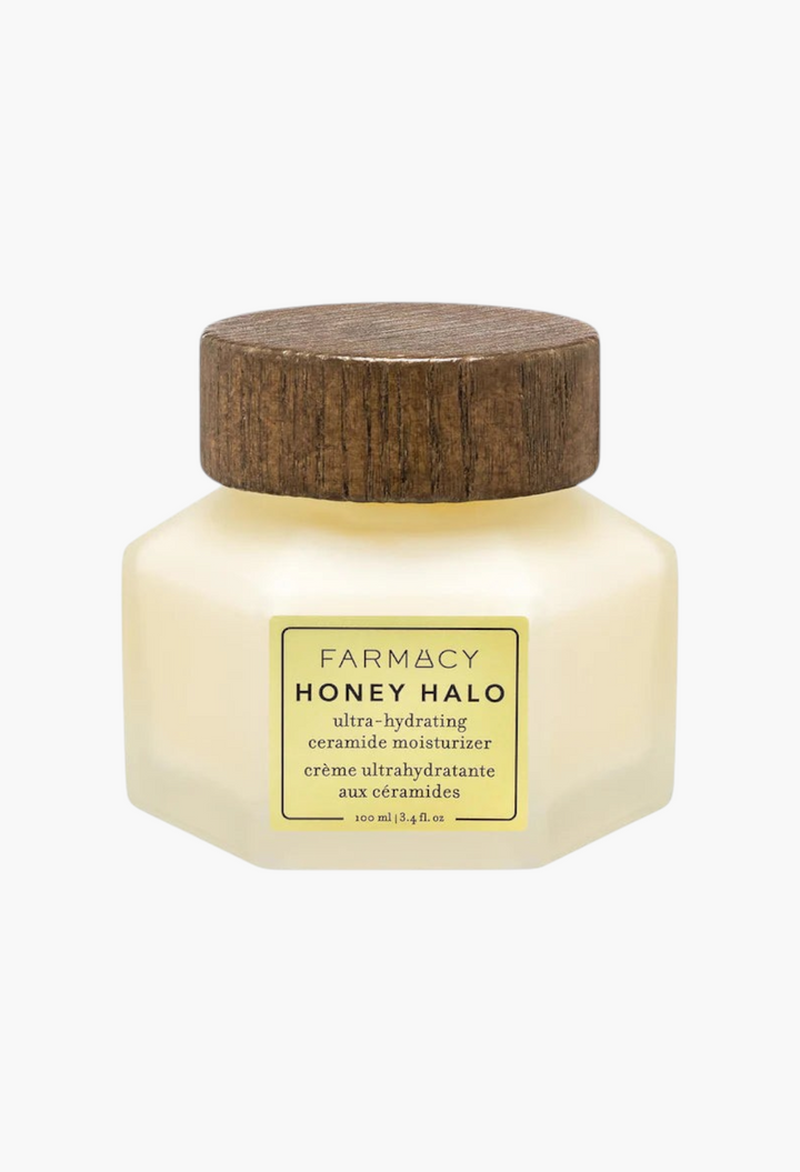 GLAM MODA Honey Halo ultra-hydrating ceramide moisturizer in a hexagonal glass jar with a wooden lid.