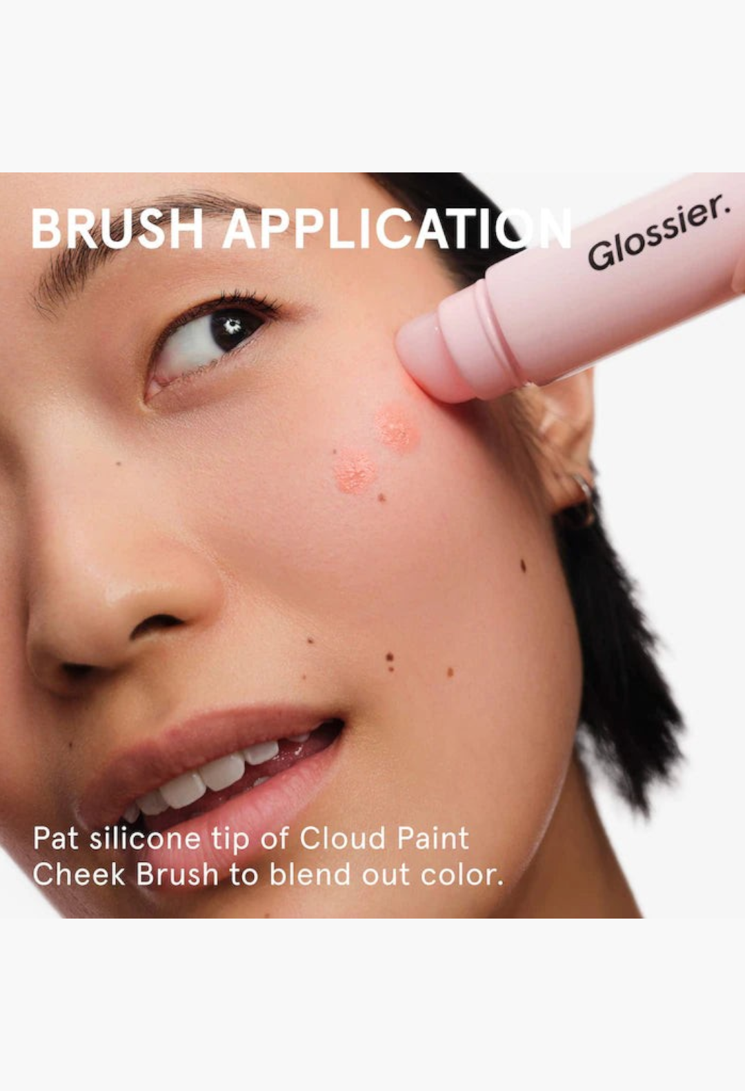 GLAM MODA Cloud Paint gel cream blush being applied to a model's cheek with a silicone applicator tip