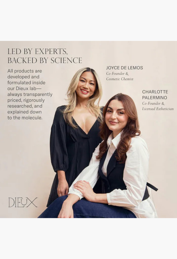 GLAM MODA founders posing together, wearing stylish professional attire against a clean white background.