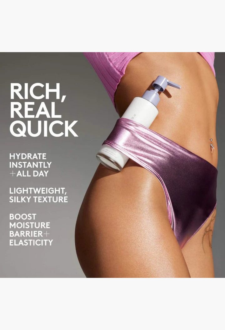 GLAM MODA Butta Drop Hydrating Body Milk bottle held against a model's hip wearing metallic purple bikini bottoms.