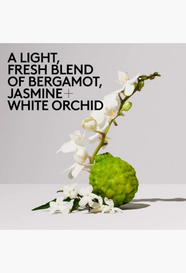 GLAM MODA Butta Drop Hydrating Body Milk ingredients featuring a green bergamot fruit with white orchid flowers