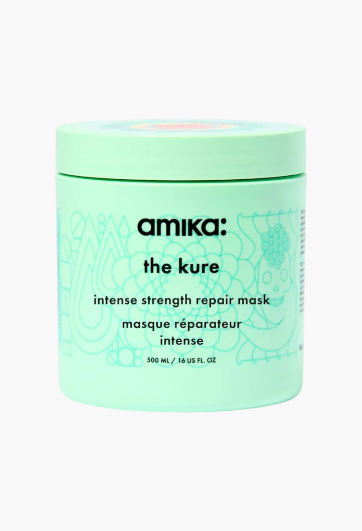 GLAM MODA amika The Kure Intense Strength Repair Hair Mask in a light green 500ml jar for damaged hair.