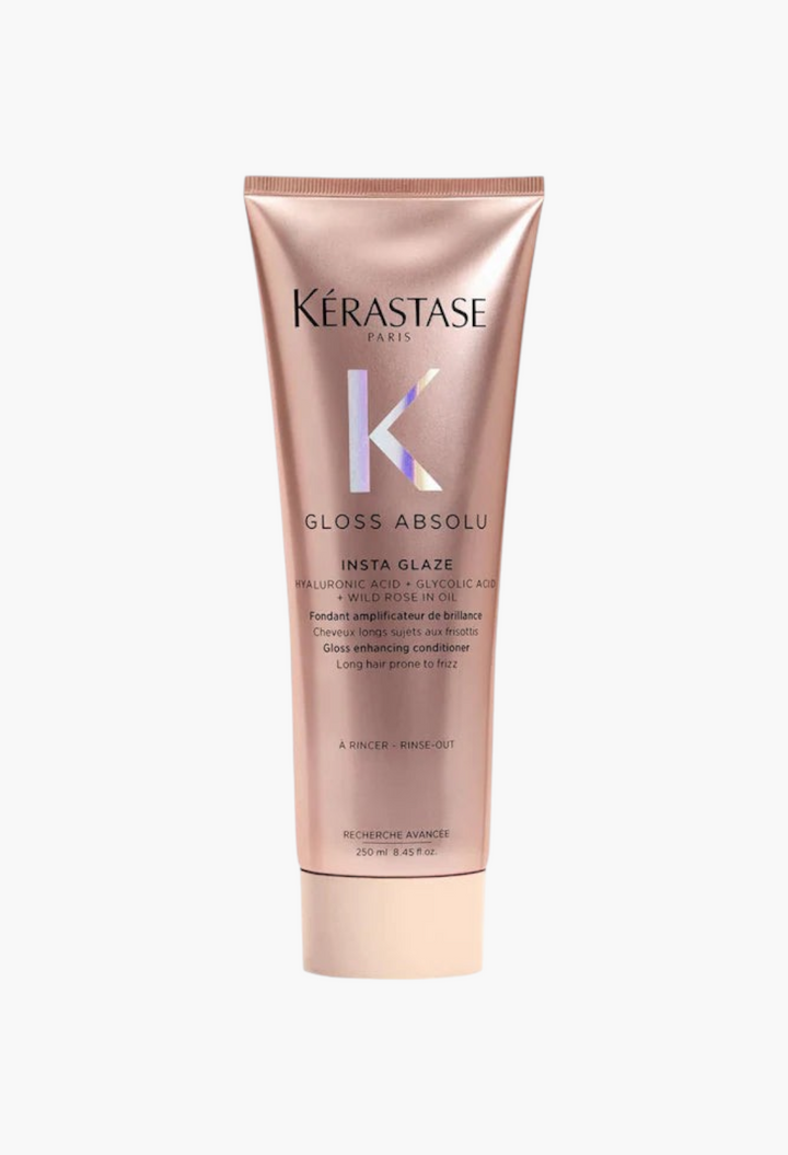 GLAM MODA Kérastase Gloss Absolu high-shine anti-frizz conditioner in a metallic rose gold 250ml squeeze tube.