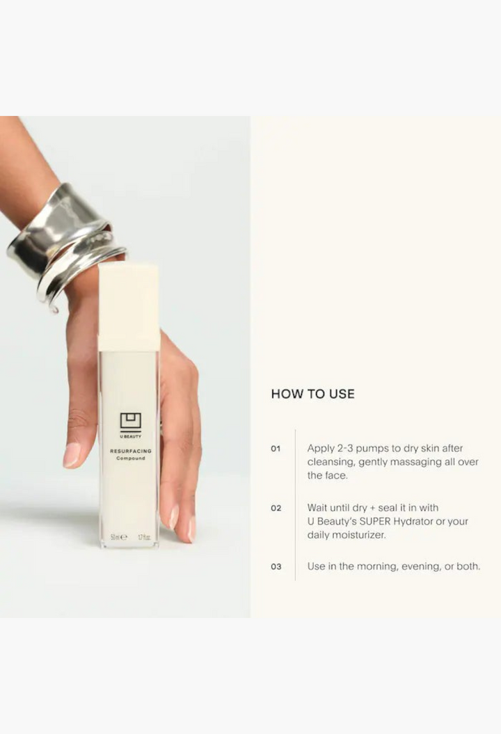 GLAM MODA U Beauty Resurfacing Compound face serum bottle held by a hand with a silver cuff bracelet.