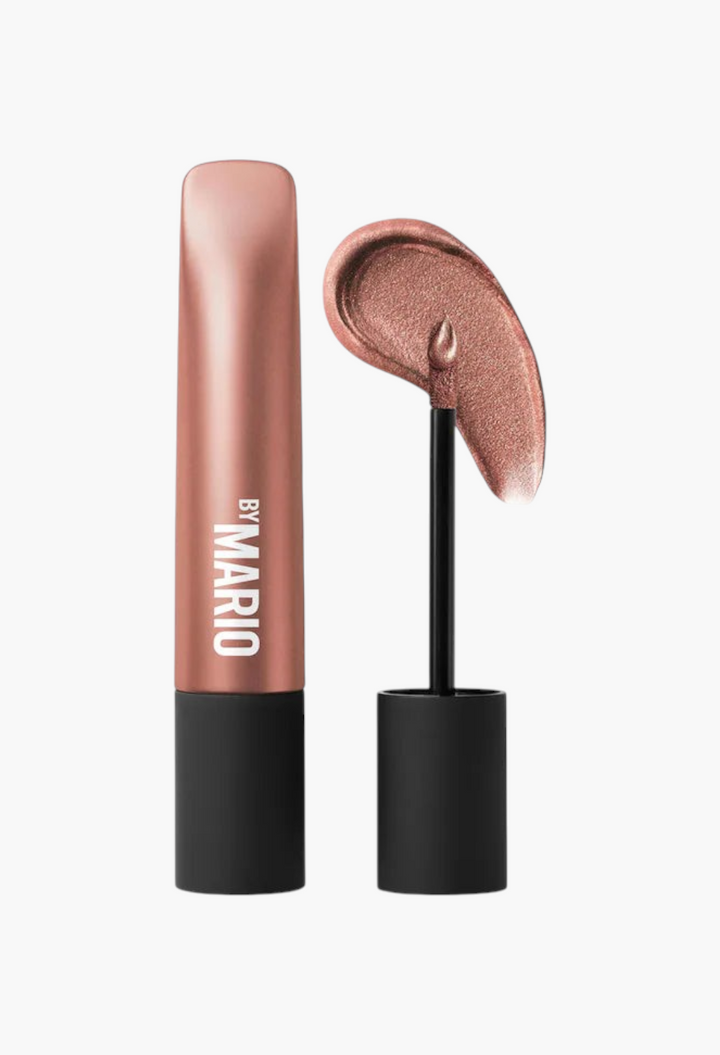 GLAM MODA long-wear shimmer cream eyeshadow in a metallic bronze shade with a doe-foot applicator showing a swatch.