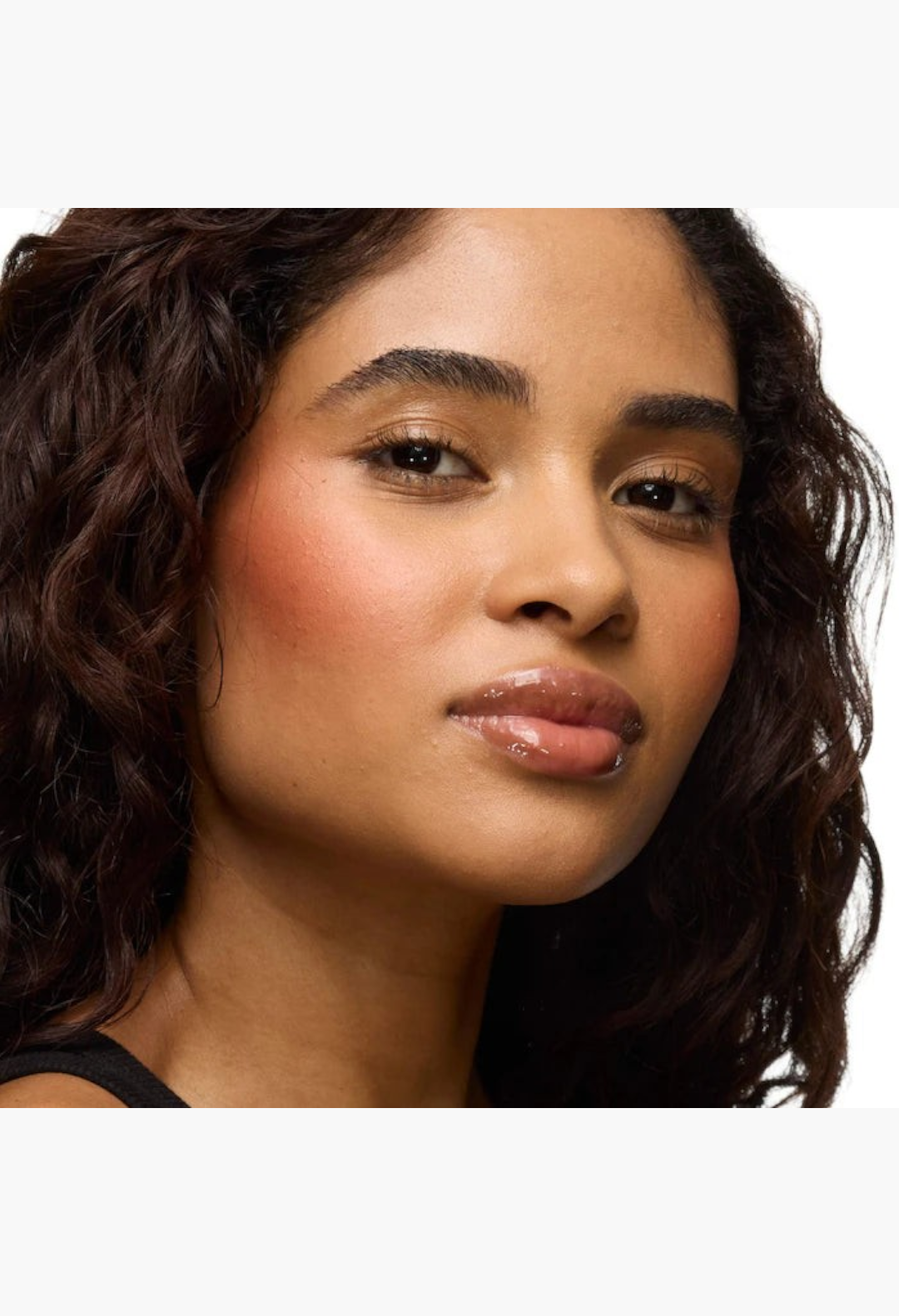 GLAM MODA model wearing YSL Brewed Reflections Couture Face Palette with a soft-diffused blush flush on cheeks