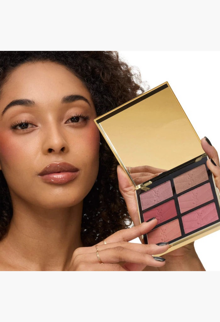 GLAM MODA model holding YSL Brewed Reflections Couture Face Palette with six blush and highlighter shades