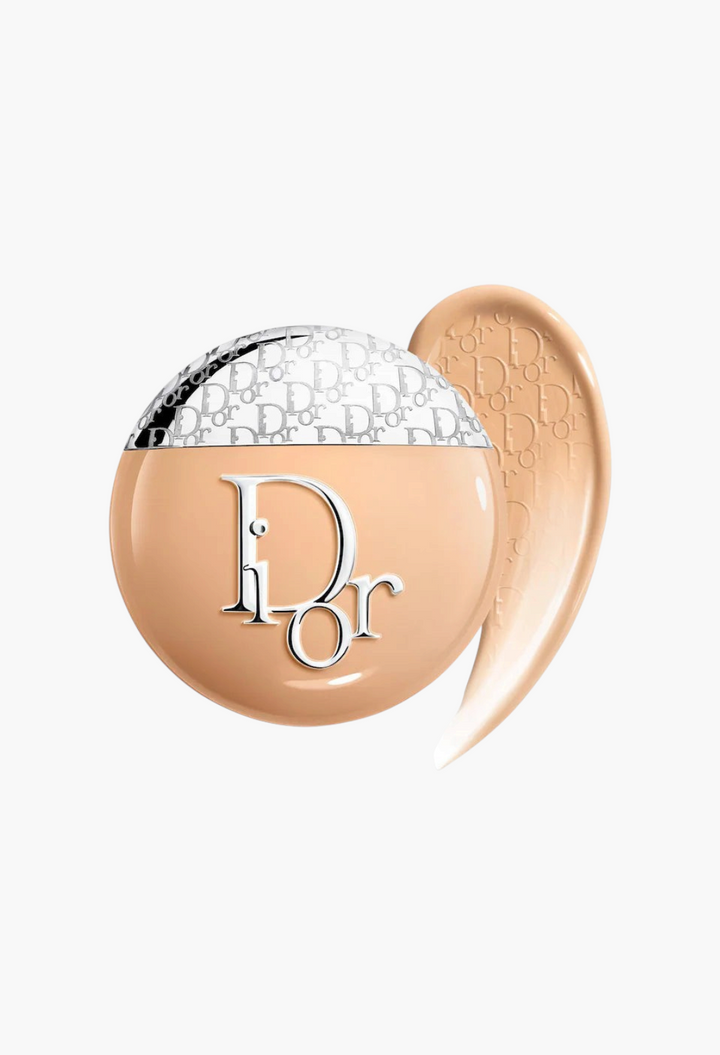 GLAM MODA Dior Backstage Glow-Up Skin Tint liquid moisturizer with SPF 20, featuring a round bottle and product swatch.