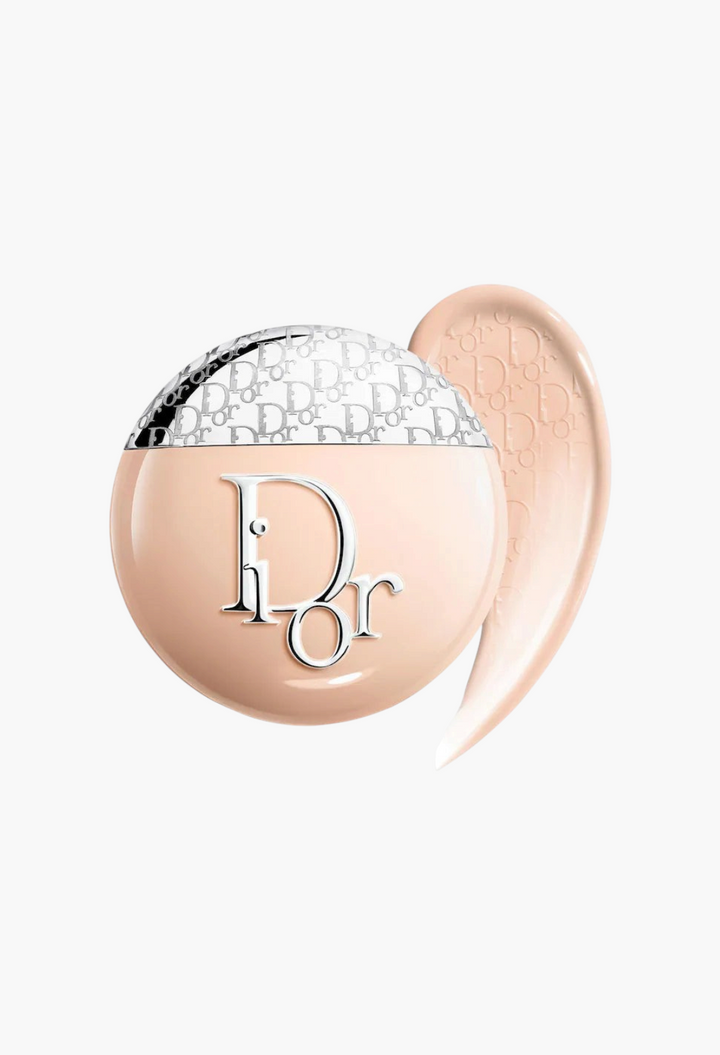 GLAM MODA Dior Backstage Glow-Up Skin Tint liquid moisturizer with SPF 20 in a round bottle with a silver logo cap.