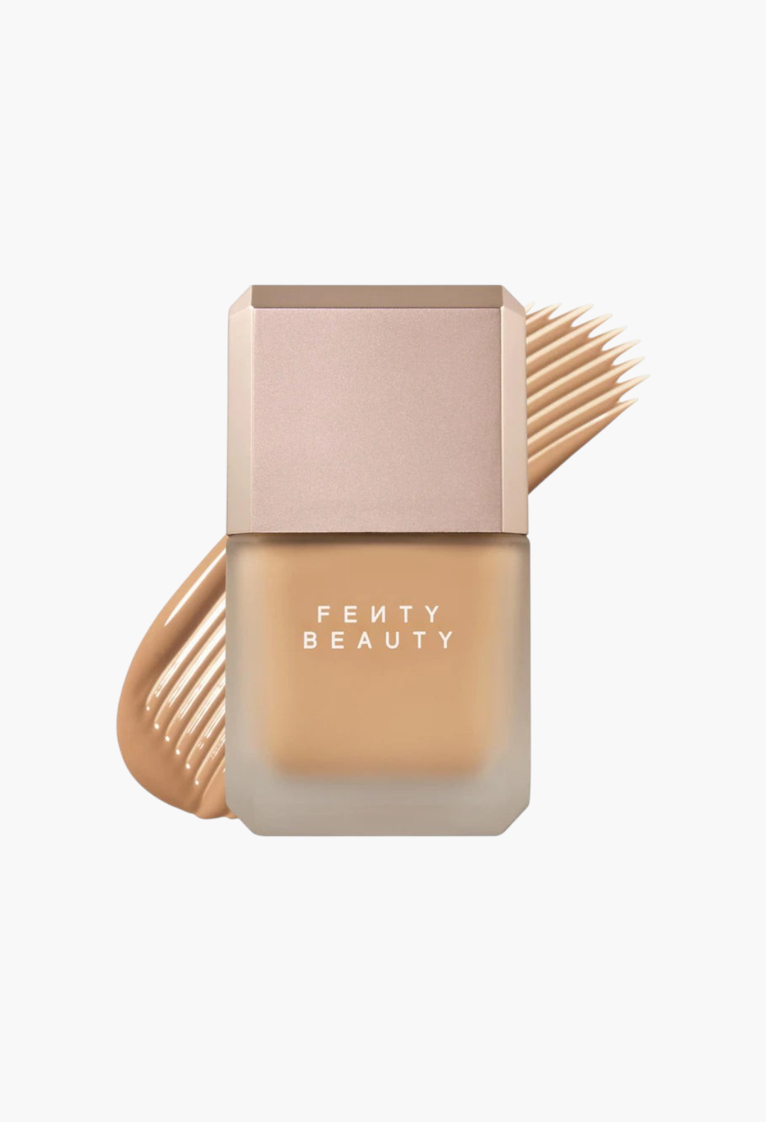 GLAM MODA Fenty Beauty Pro Filt'r liquid foundation bottle with a swatch of beige matte makeup behind it.