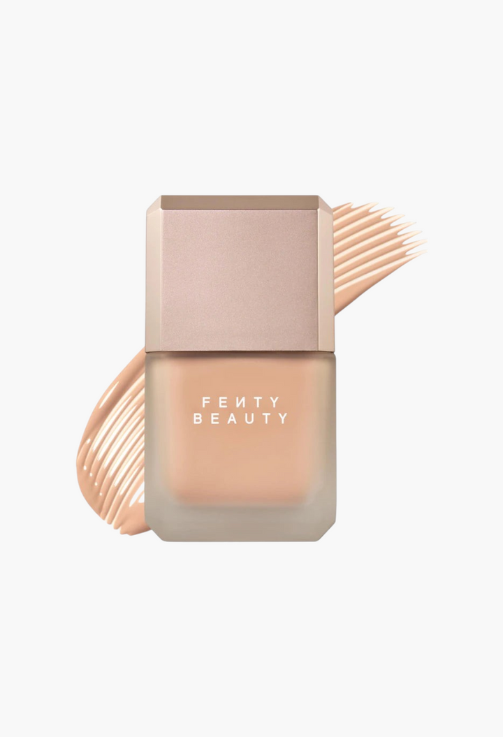 GLAM MODA Fenty Beauty Pro Filt'r liquid foundation in a frosted glass bottle with a beige cap and foundation swatch