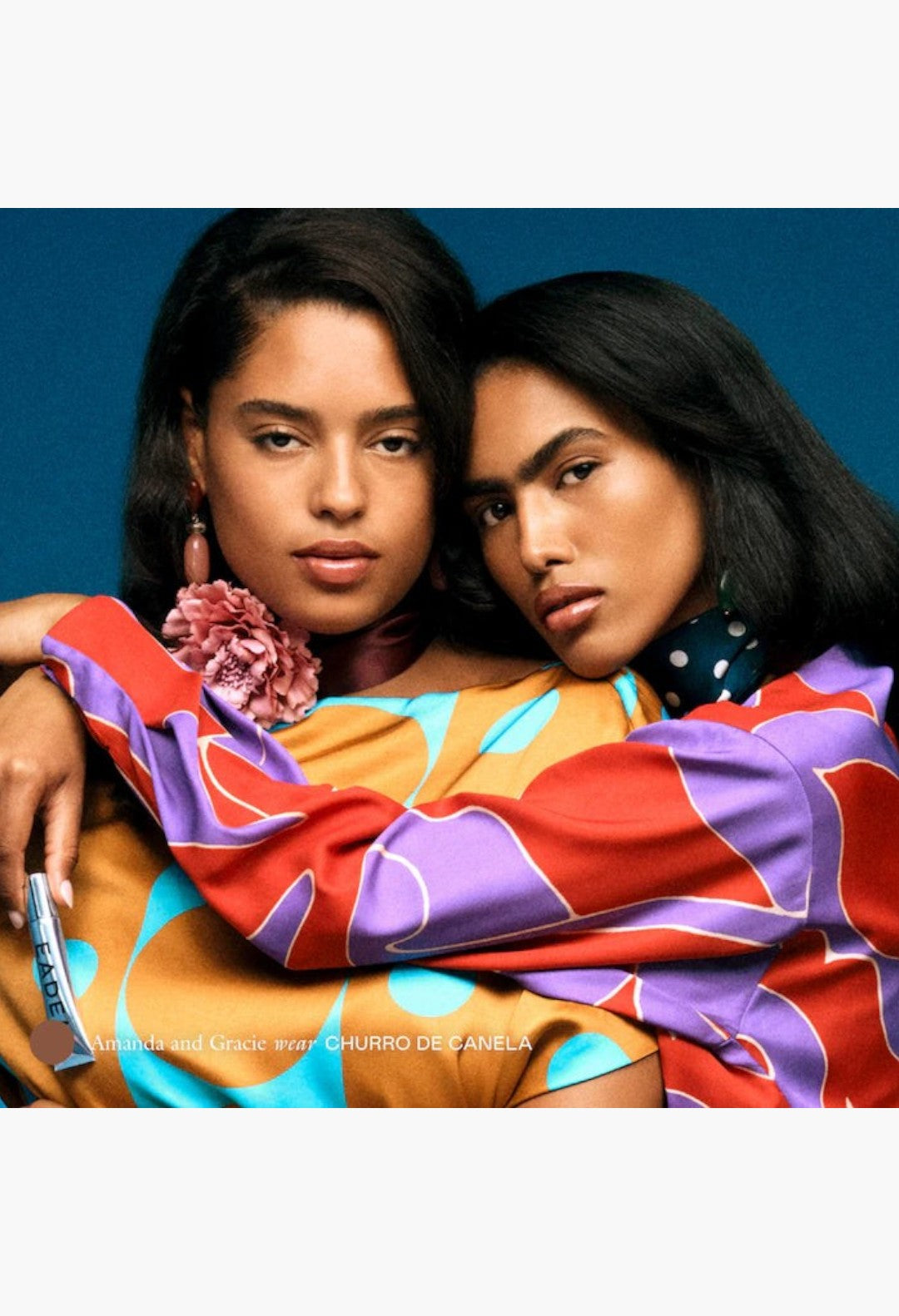 GLAM MODA Le Chouchou peptide lip balm in Churro de Canela shade worn by two models with glossy, hydrated lips.