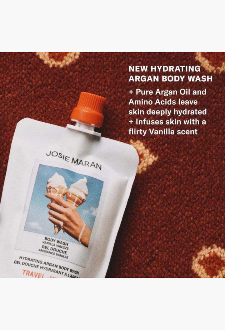GLAM MODA travel size Josie Maran Vanilla Vibezzz hydrating argan body wash in a white squeeze pouch
