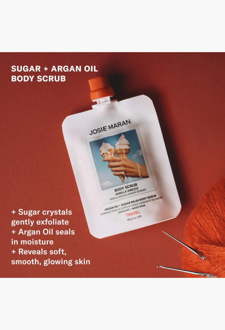 GLAM MODA Josie Maran Vanilla Vibezzz travel size Argan Oil and sugar balm body scrub in a white squeeze pouch
