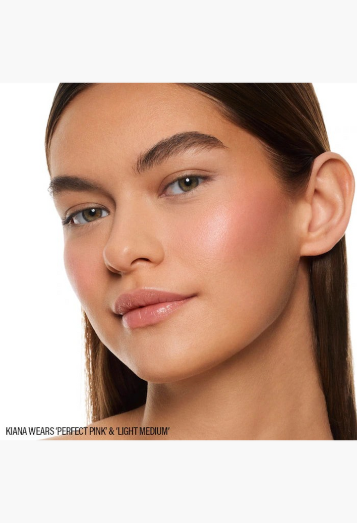 GLAM MODA model wearing dewy pink cream blush and bronzer on cheeks for a natural glowing makeup look
