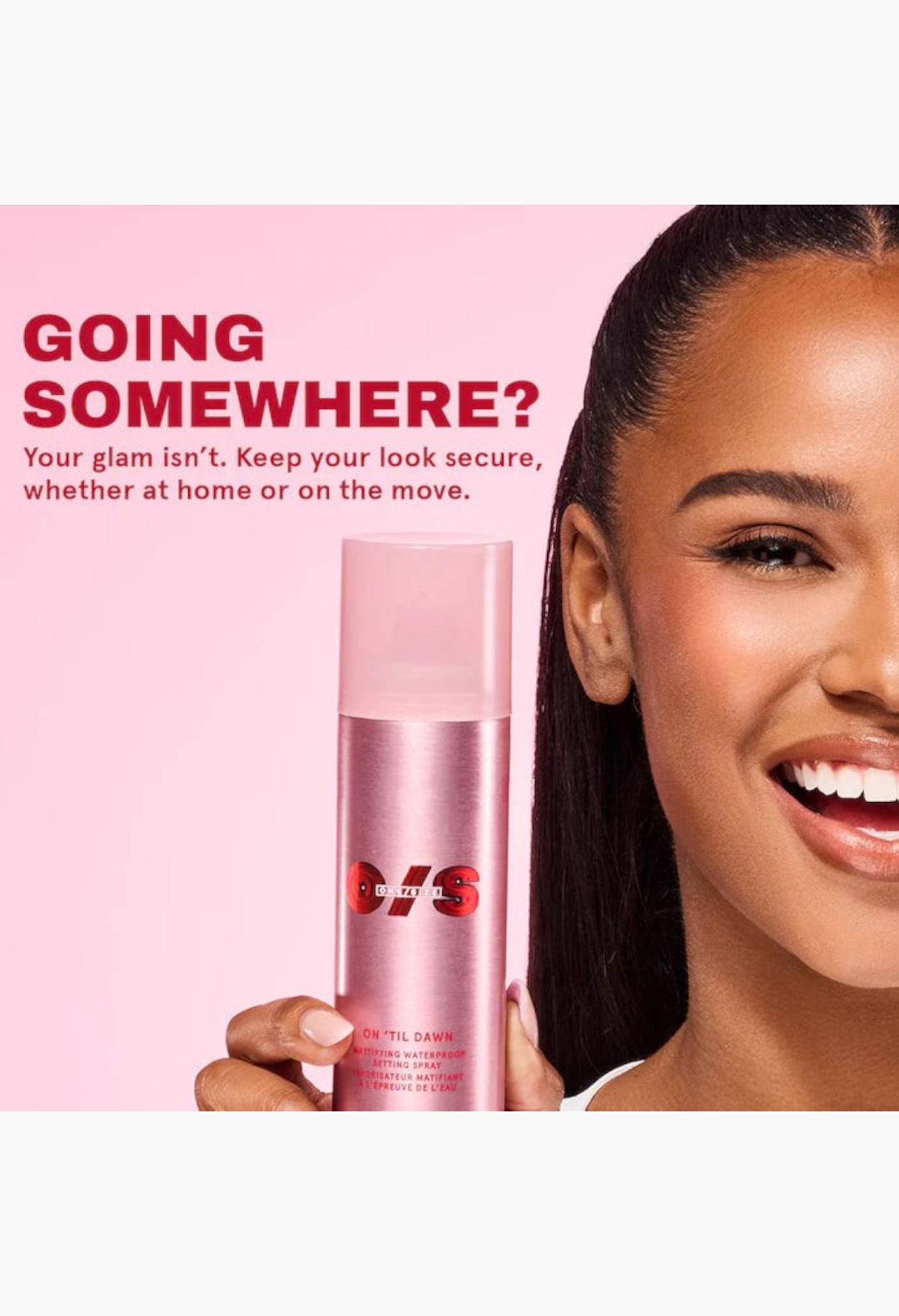 GLAM MODA On 'Til Dawn mattifying waterproof setting spray held by a smiling woman with a glowing complexion.