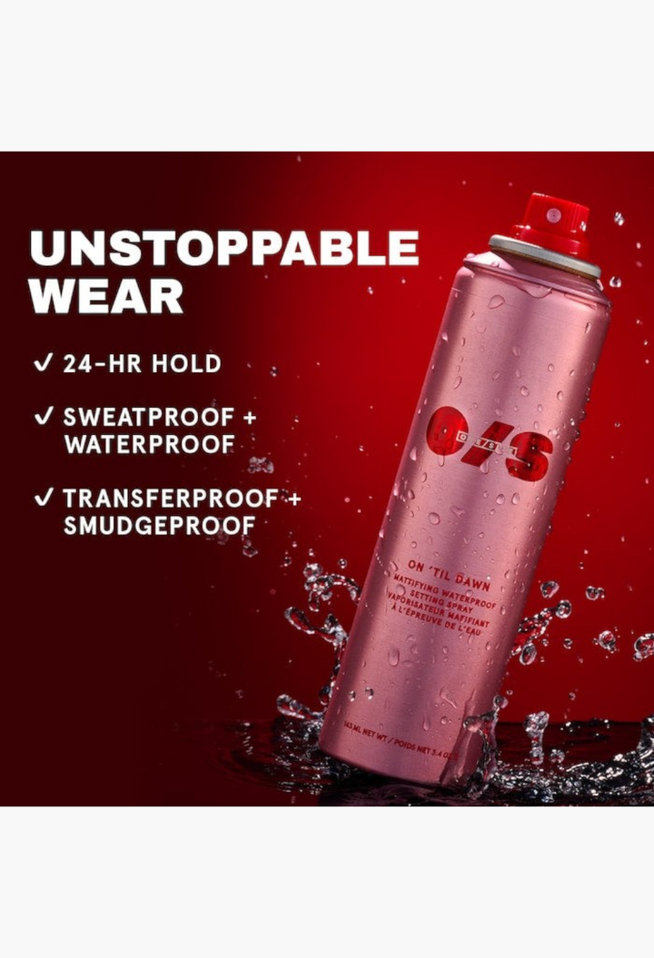 GLAM MODA On 'Til Dawn waterproof mattifying setting spray in a metallic pink aerosol can with water splashes