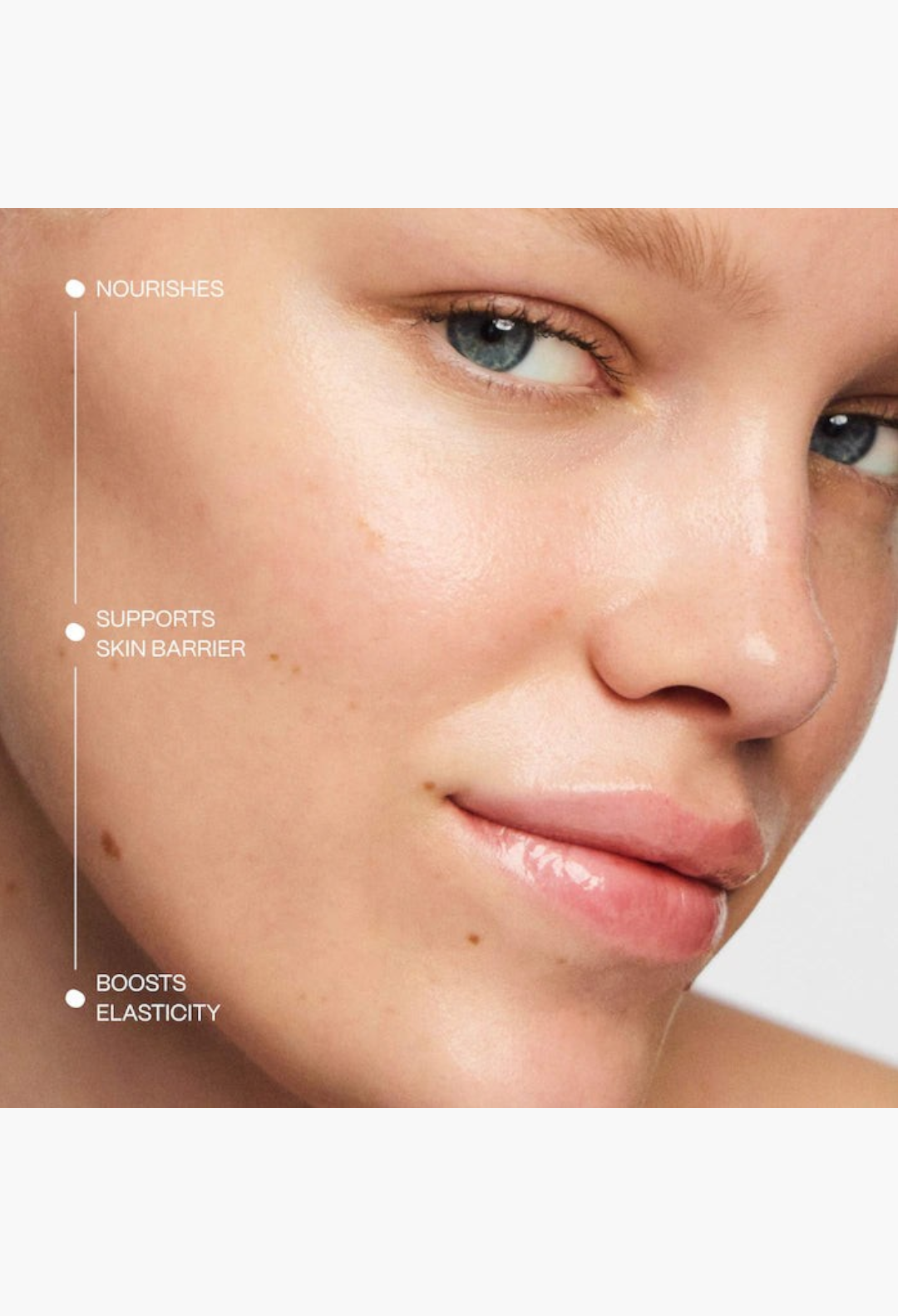 GLAM MODA hydrating whipped cream applied to a model's glowing, nourished skin to support the barrier and elasticity.