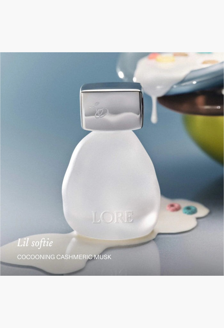 GLAM MODA Lore Lil Softie perfume bottle with a frosted glass finish and silver cap, featuring a musky scent profile.