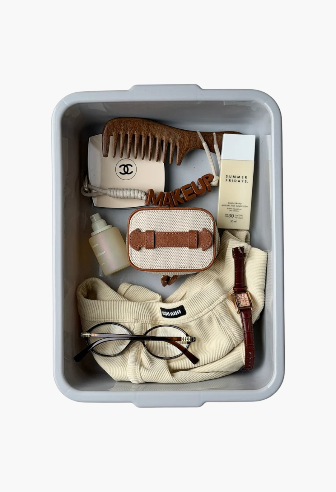 GLAM MODA mini jewellery case in a checkerboard canvas, displayed in a storage bin with travel accessories.