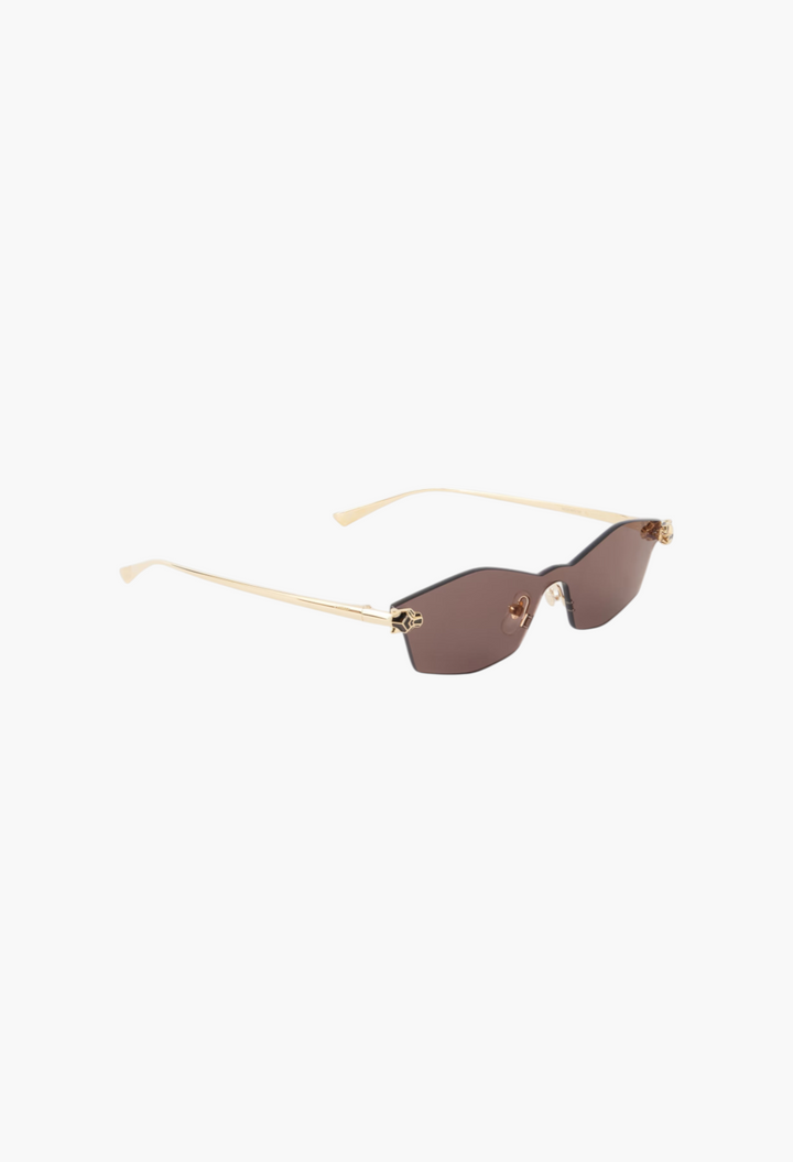 GLAM MODA Panthère de Cartier D-frame sunglasses in gold-tone metal with purple tinted lenses and panther accents.